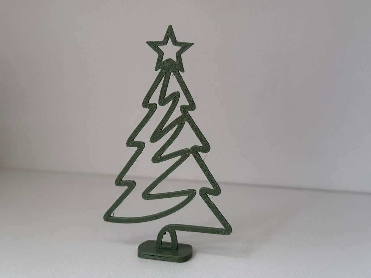 Minimalistisk juletræsfigur med stjerne og standfod