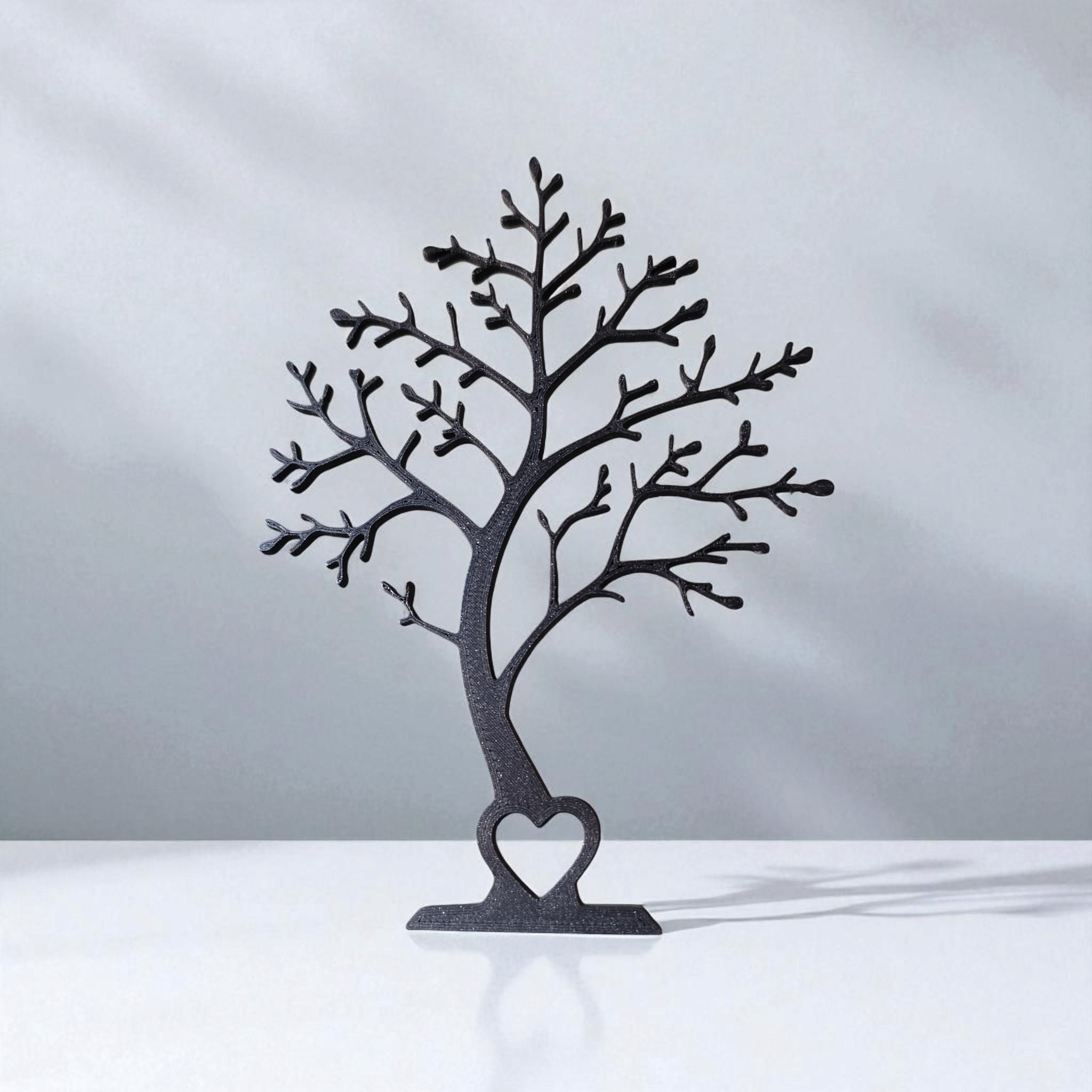 Minimalist tree decor silhouette viewed from the front, showing clean branch lines
