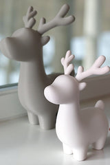 Close-up of minimalist Christmas reindeer decoration showing clean lines