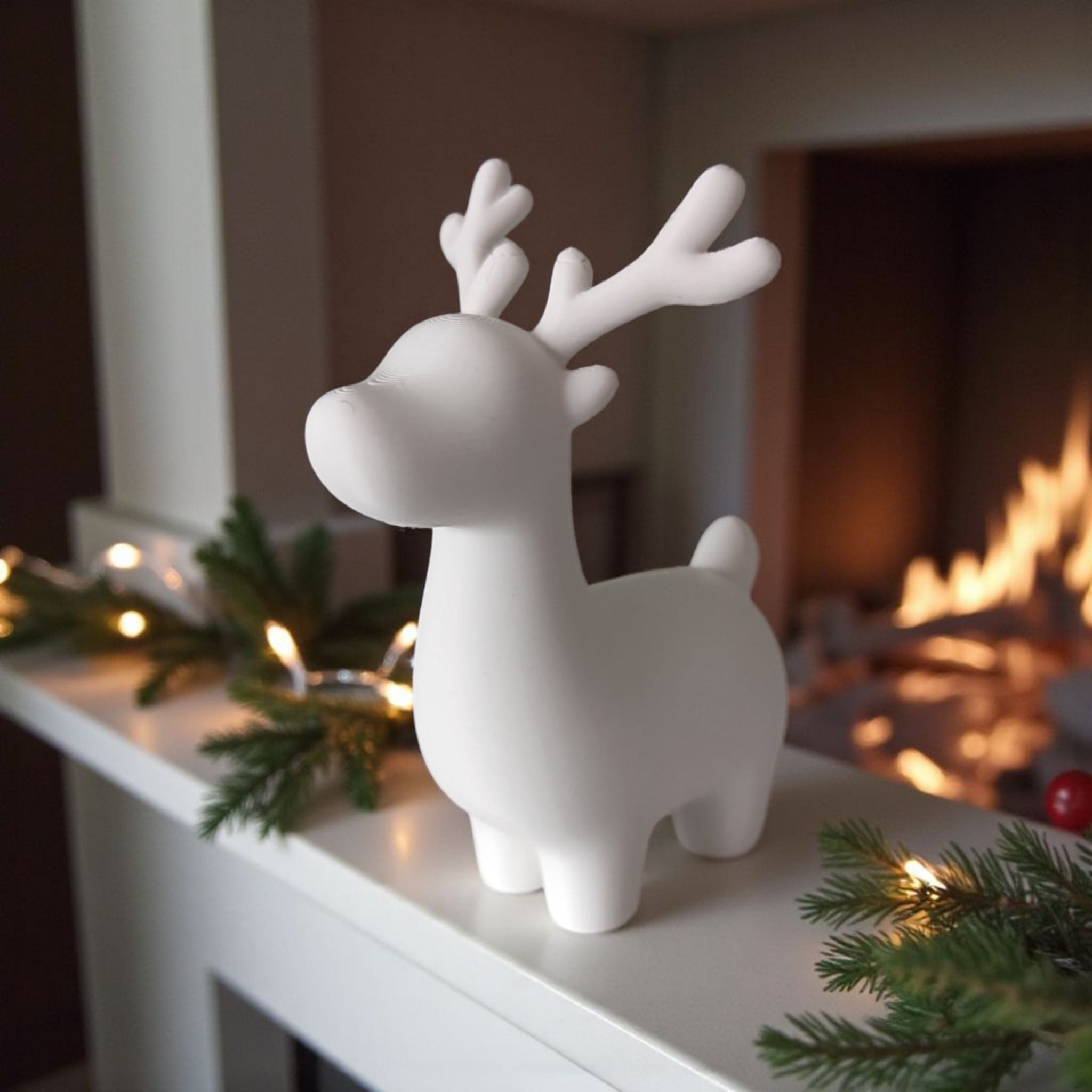 Minimalist Christmas reindeer sitting on a white windowsill with natural light