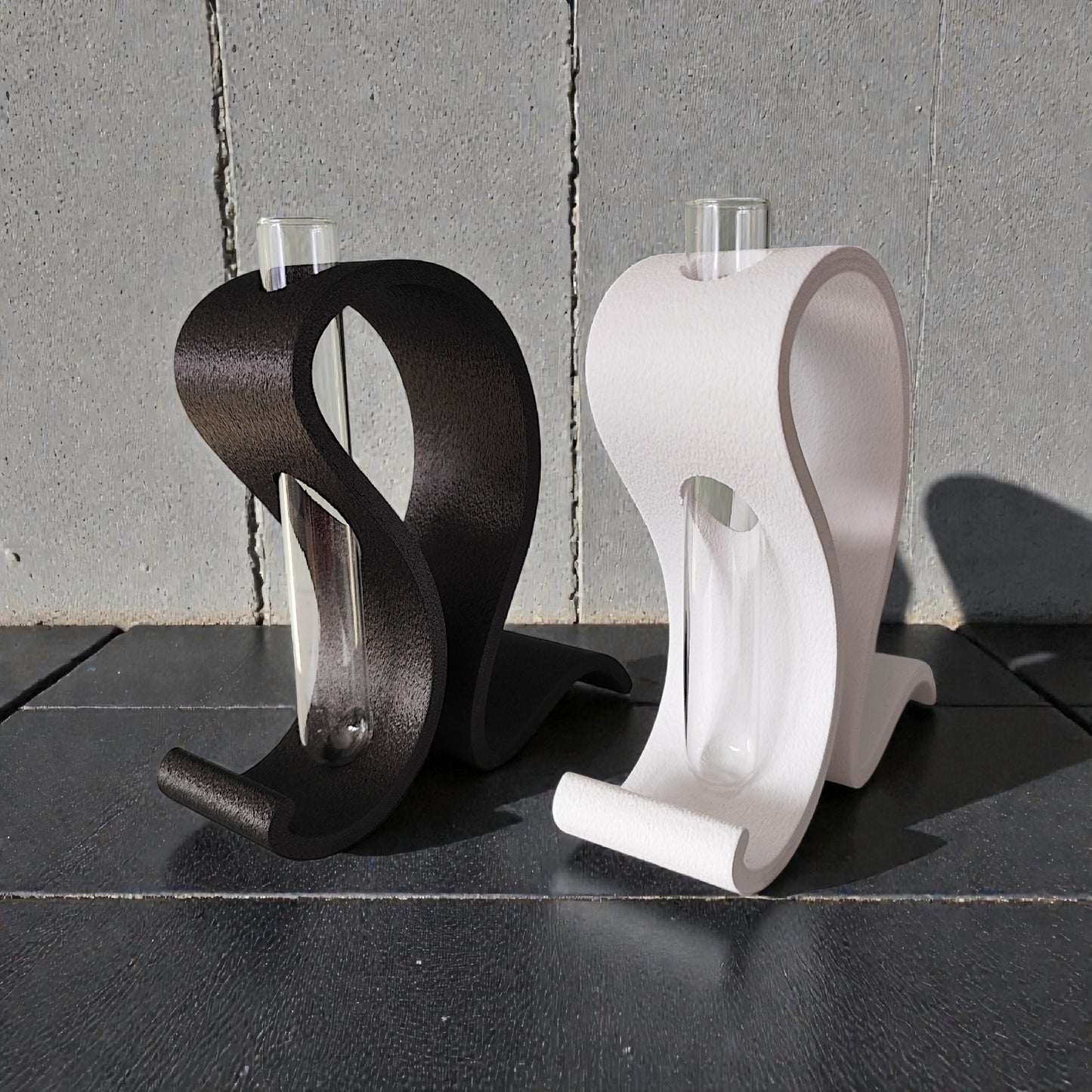 Close-up of textured test tube vase stand with matte surface finish