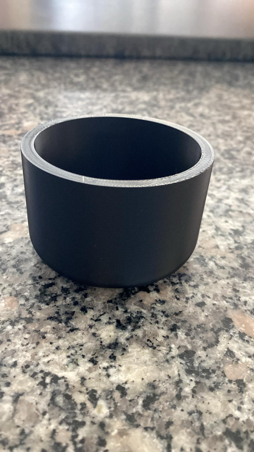 Detail view of the smooth cylindrical form of the round plant pot