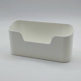 Wall-mounted organizer box holding kitchen essentials on kitchen wall