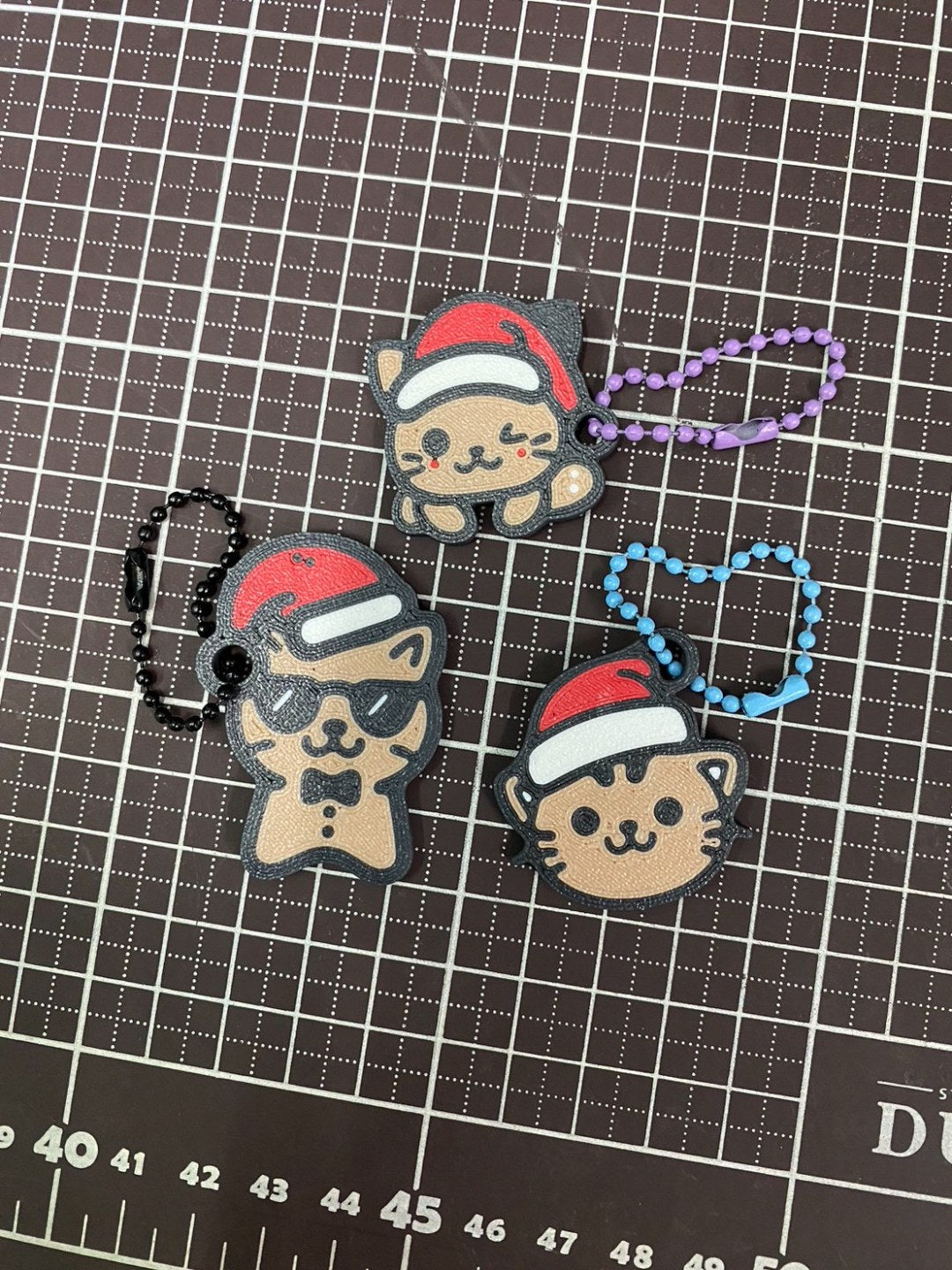 Juletræspynt formet som en honningkagekat