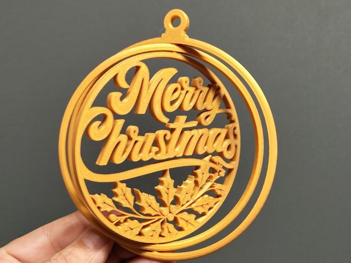 Julekugle-gyroball med teksten Merry Christmas