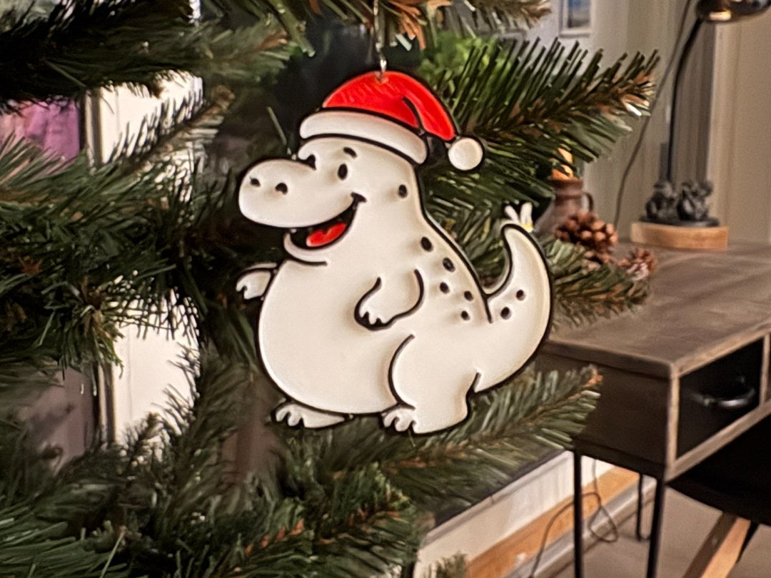 Lille dinosaur som juletræspynt