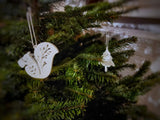 Otte juletræspynt formet som dyr