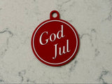 Elegant juletræspynt med teksten God Jul