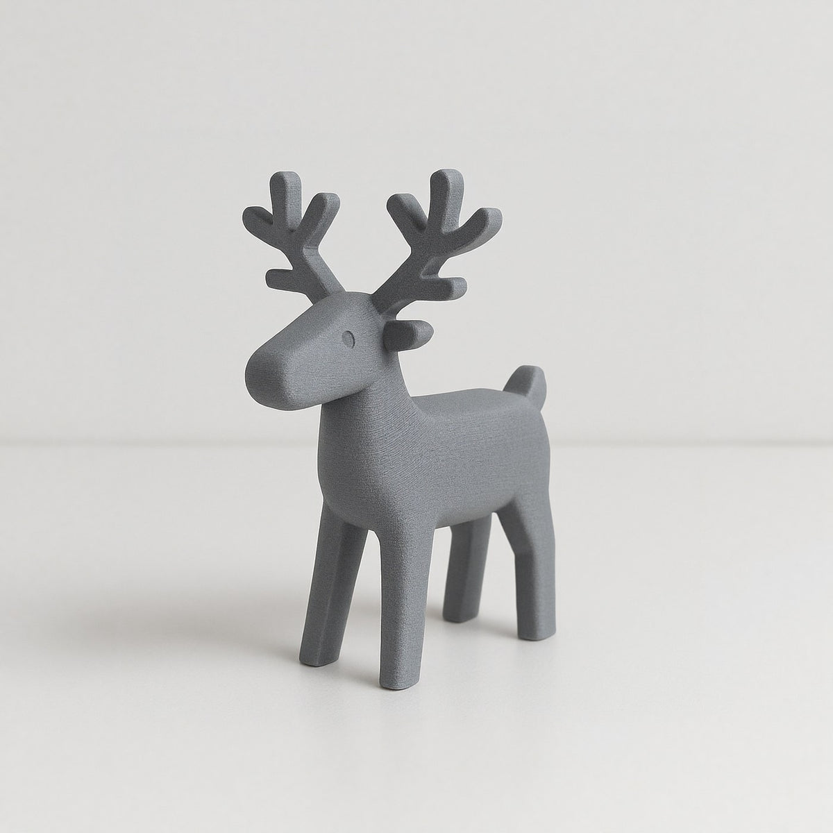 Minimalistisk rensdyrfigur med rene linjer