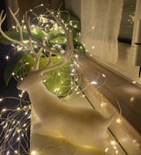 Siddende rensdyrfigur – julepynt