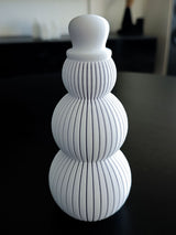 Snemandsfigur i riflet design
