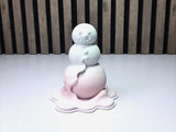 Moderne figur af en smeltende snemand